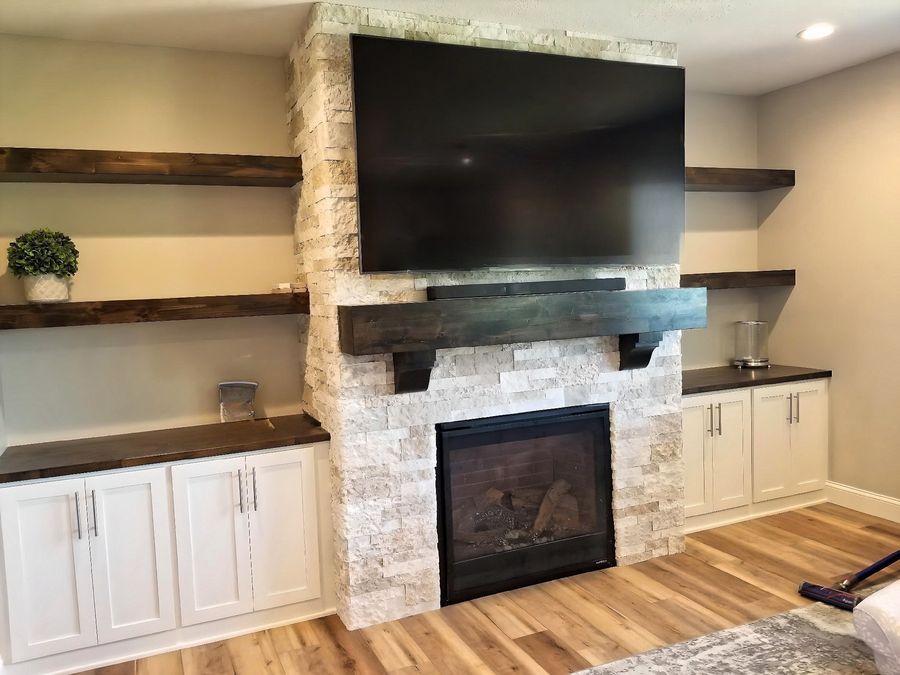 Custom fireplace built-ins by Picha's Cabinet Shop.